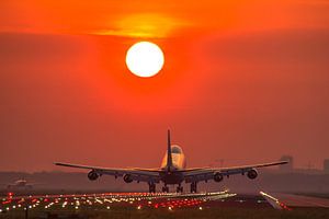 Boeing 747 landing during sunrise by Dennis Dieleman