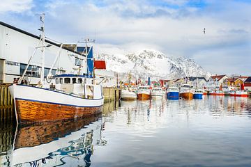 Fishing boats in Henningsvaer in winter in the Lofoten in Norway by Sjoerd van der Wal