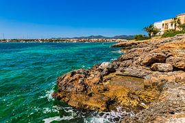 Coastline of Portocolom with view of the old town and harbour by Alex Winter