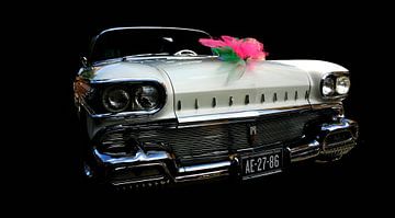 Oldsmobile before a black background by Henk Langerak