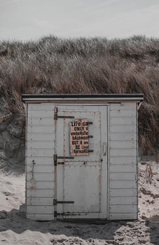 The message on the beach cabin.