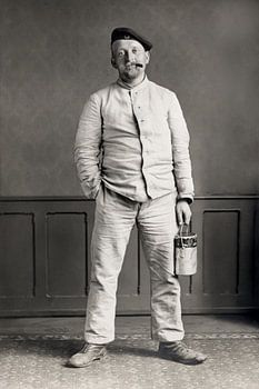 Historical portrait: A relaxed craftsman with a cigar and a bucket