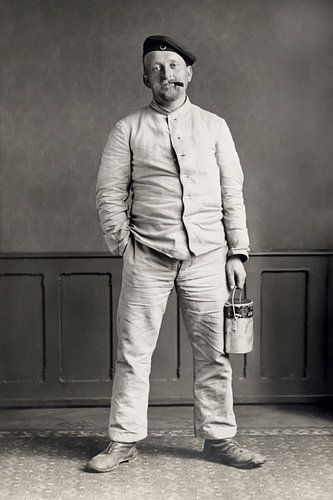 Historical portrait: A relaxed craftsman with a cigar and a bucket