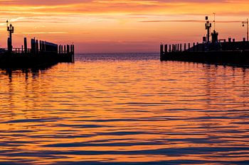 Sunrise in the harbour of Oudeschild on Texel