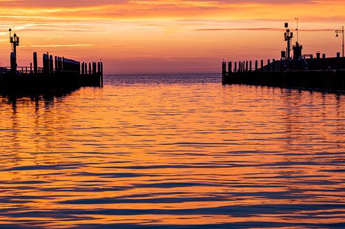 Sunrise in the harbour of Oudeschild on Texel