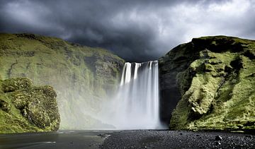 Iceland waterfal with a stormy sky