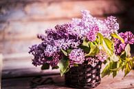Bouquet of lilacs against wooden background by BeeldigBeeld Food & Lifestyle thumbnail