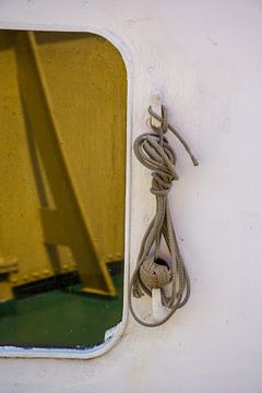 Een werplijn aan de haken van scheepskijkerhavenfotografie