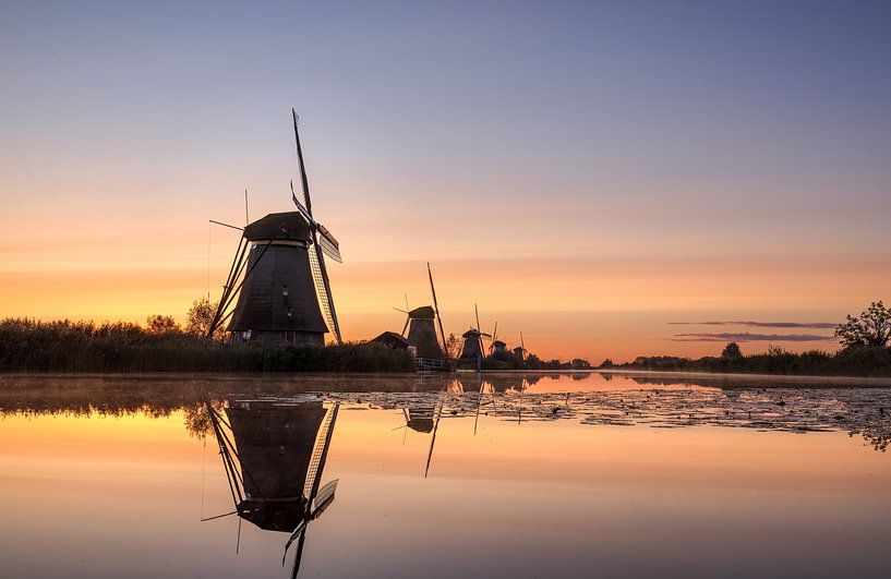 Sunrise at Kinderdijk: An Iconic Mill Landscape in Full Glory by Hevonax Photography