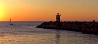 Zonsondergang in Scheveningen Haven van Maurits van Hout thumbnail