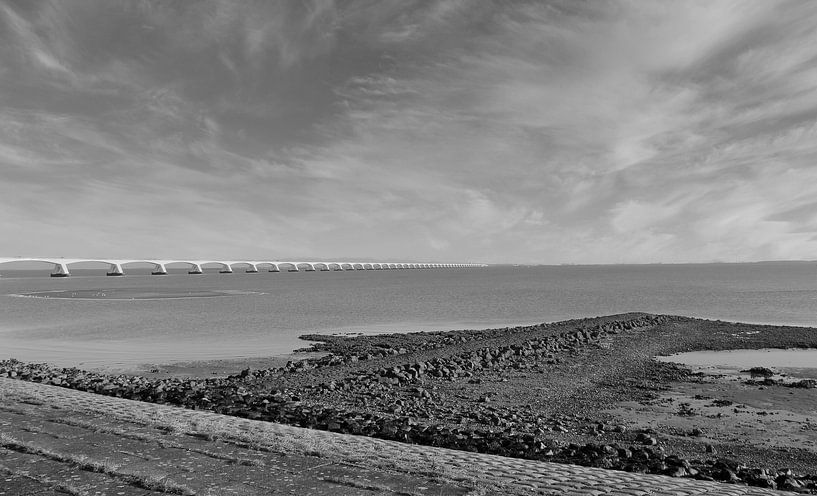 Zeeland bridge in the landscape in black and white by Jose Lok