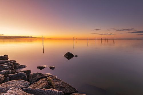 Cold colourful sunrise on the Markermeer near Hoorn