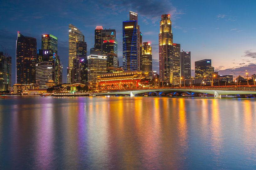 Singapore skyline in the blue hour by Ilya Korzelius