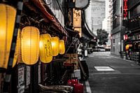 Yellow lantern during a grey day