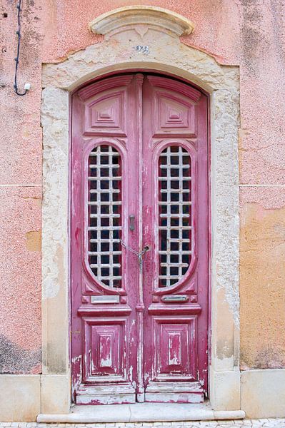 The doors of Portugal pink number 22 by Stefanie de Boer