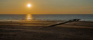 Ondergaande zon te Westende-bad
