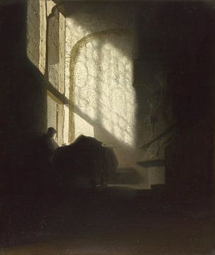Een man zittend en lezend aan een tafel in een hoge kamer, volger van Rembrandt