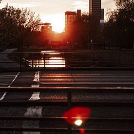 De Achmeatoren in Leeuwarden met zonsondergang van Nando Foto