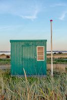 Green beach house on the island of Aero in Denmark