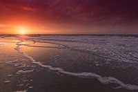 Beautiful afterglow at sunset on The Hague beach