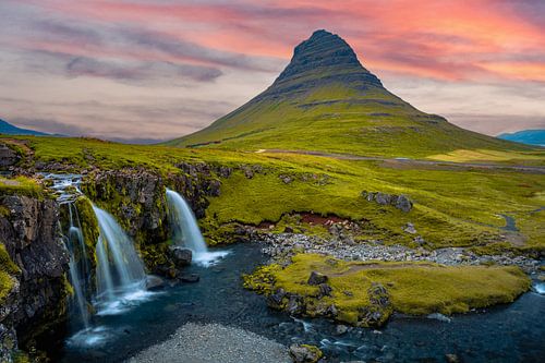 Kirkjufellsfoss waterfall and Kirkjufell mountain in Iceland