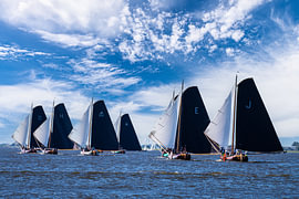 Sailing in a skutsje on the Frisian Lakes.