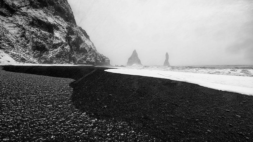 Cold Iceland; Where snow, lava sand and water meet. by Michael Kuijl