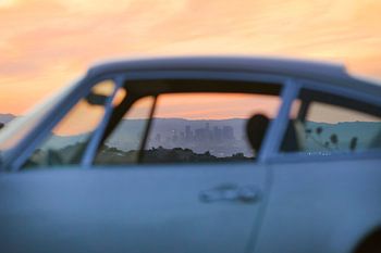 LA skyline through the window of a 911