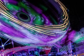 Rotation in Light – The Carousel as a Circular Trail of Movement by Mixed media vector arts