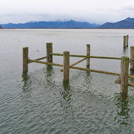 Remains of an old landing stage for boats on Lake Chiemsee by Heiko Kueverling