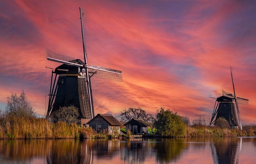 Molens van Kinderdijk bij mooie avondgloed van Chi