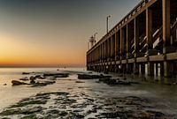 De pier bij zonsondergang
