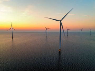 Wind turbines in an offshore wind park producing electricity dur by Sjoerd van der Wal Photography