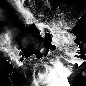 Clashing puzzle pieces black and white by Marjolijn van den Berg