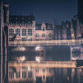 Night shot of the medieval houses with passing tram near the Castle of the Counts in the city of Ghe by Daan Duvillier | Dsquared Photography