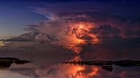 Powerful thunderstorm over a lake