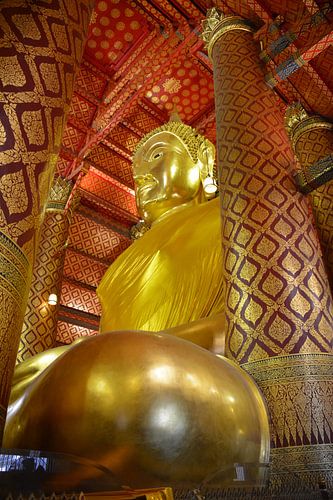 Golden seated Buddha in temple Ayutthaya Thailand by My Footprints