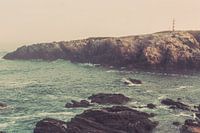 Wild coast Portugal with lighthouse