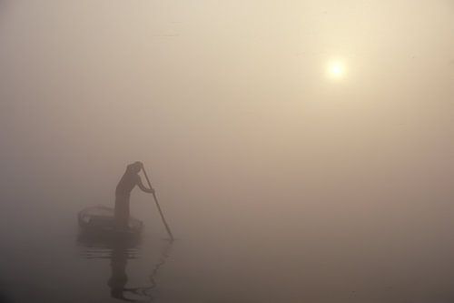 Rower in the fog