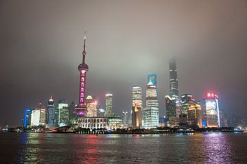 Shanghai skyline at night by Arjen Tjallema