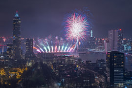 A spectacular fireworks display near the Erasmus Bridge in Rotterdam