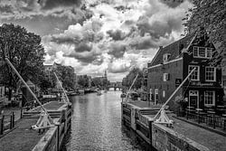 On the St Antonie lock look at the Montelbaan tower.
