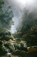 Green chairs along the river | River of Akchour in Morocco