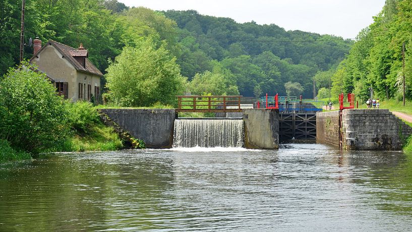 Weir and lock gate in the picturesque River Yonne in Burgundy, France by Gert Bunt