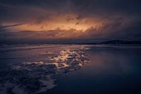 Soleil couchant au bord de la mer