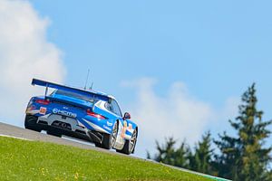 Porsche 911 RSR Rennwagen auf der Eau Rouge von Sjoerd van der Wal Fotografie