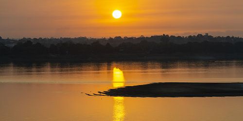 Ochtendgoud boven de Mekong