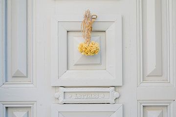 Detail of a charming French door by Jasmijn Brussé