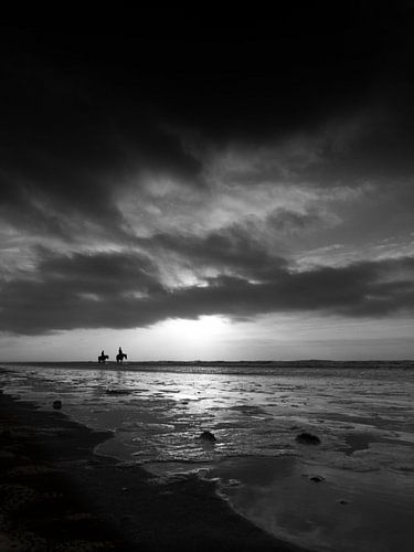 Zonsondergang aan zee