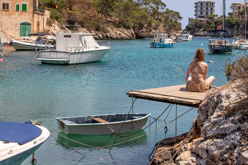Young woman on a jetty in Cala Figuera (Mallorca) by t.ART
